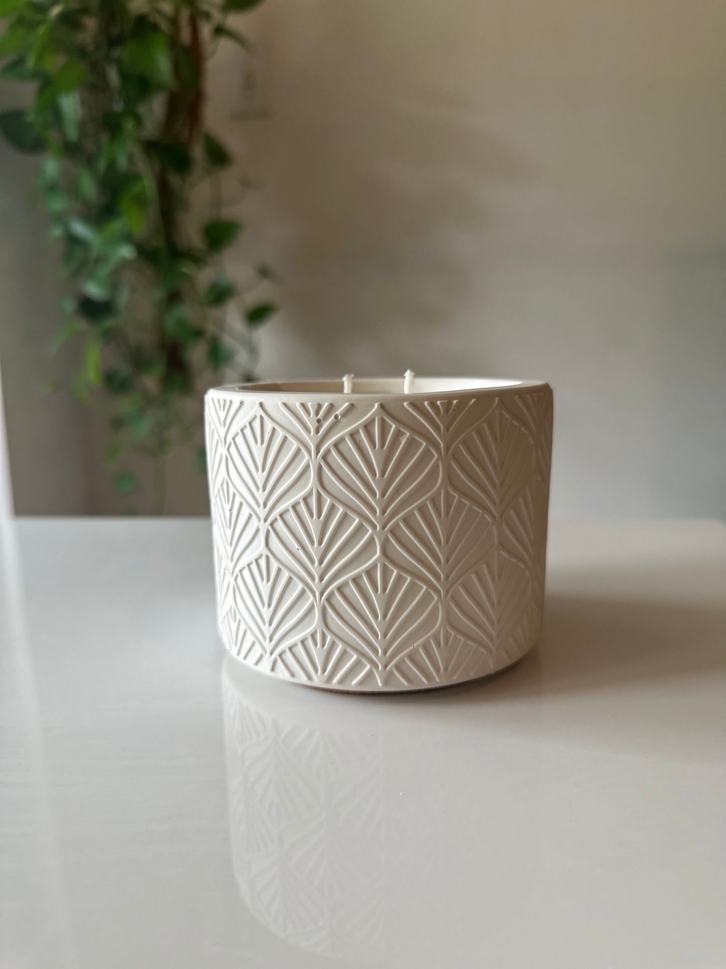 Decorative White ceramic pattern candle jar.